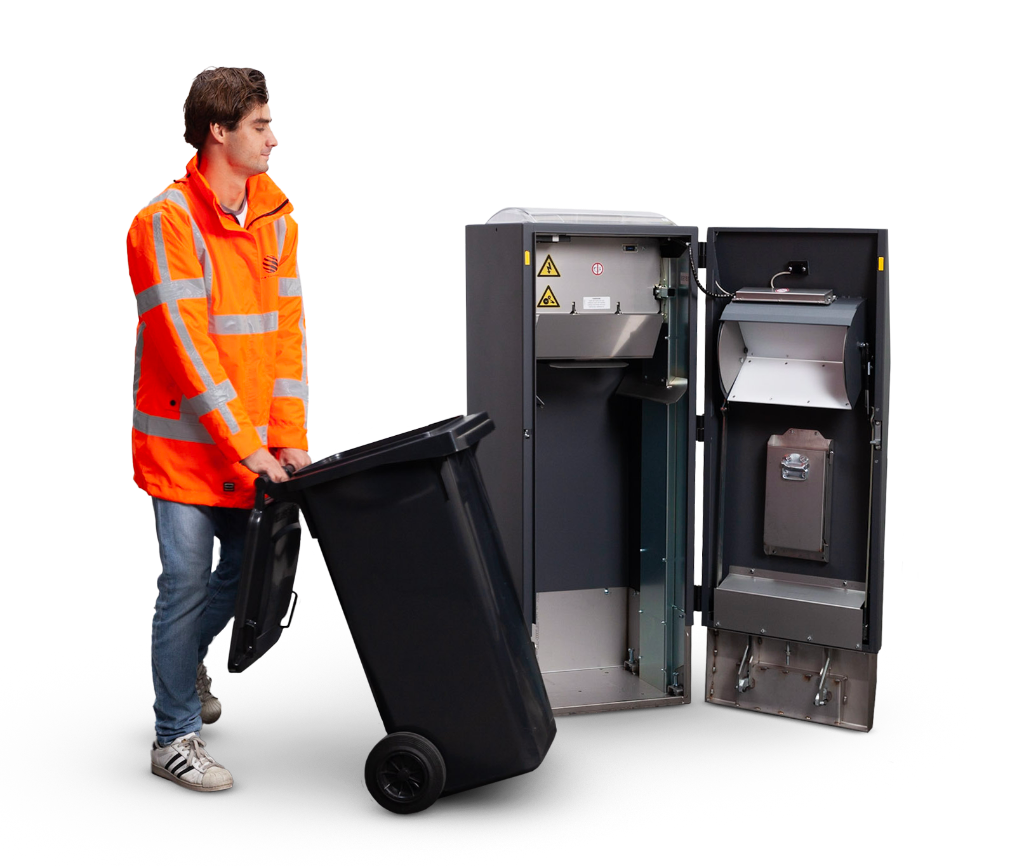 Operatore del servizio raccolta durante lo svuotamento del contenitore interno WasteMate